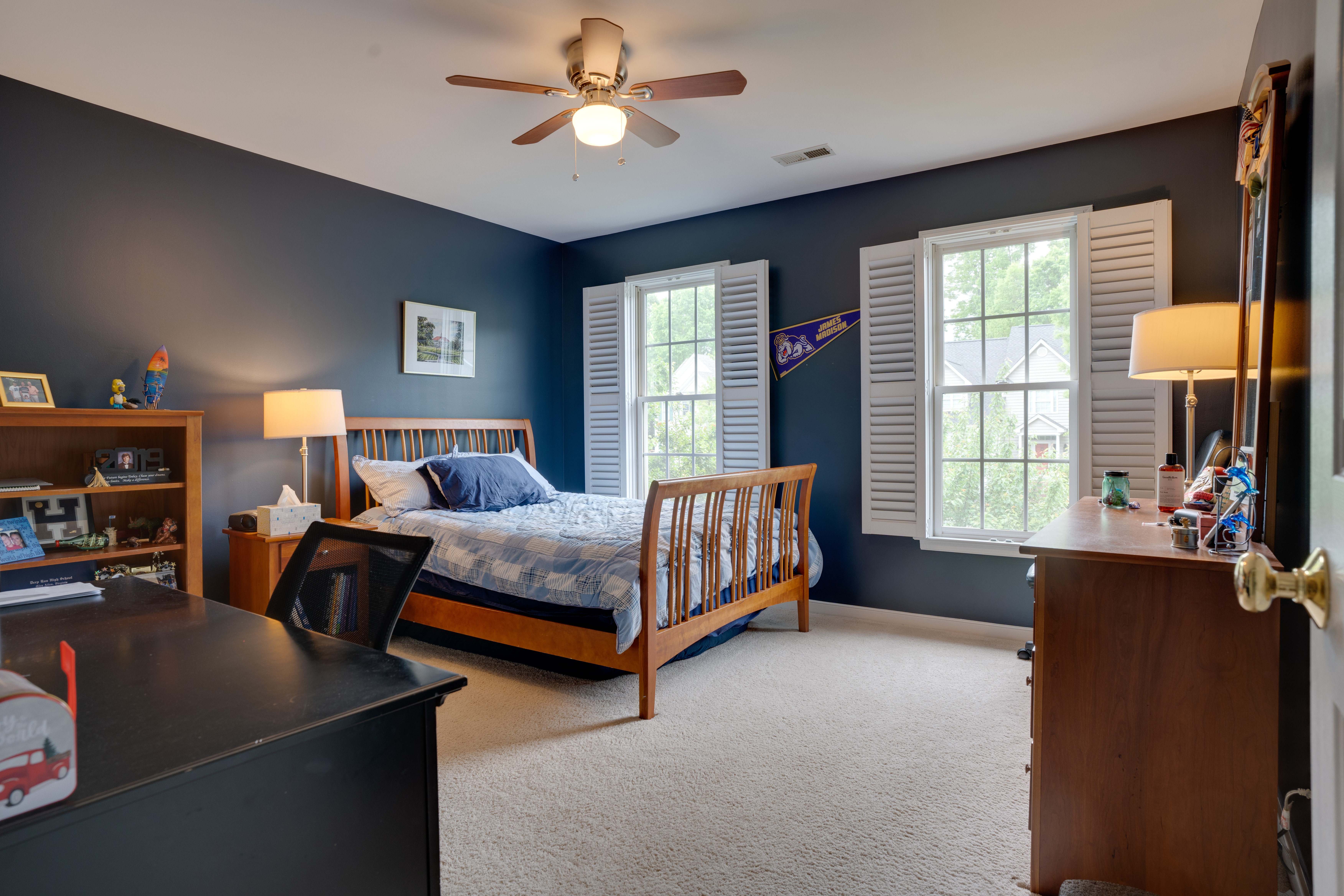 Bedroom with navy accent wall