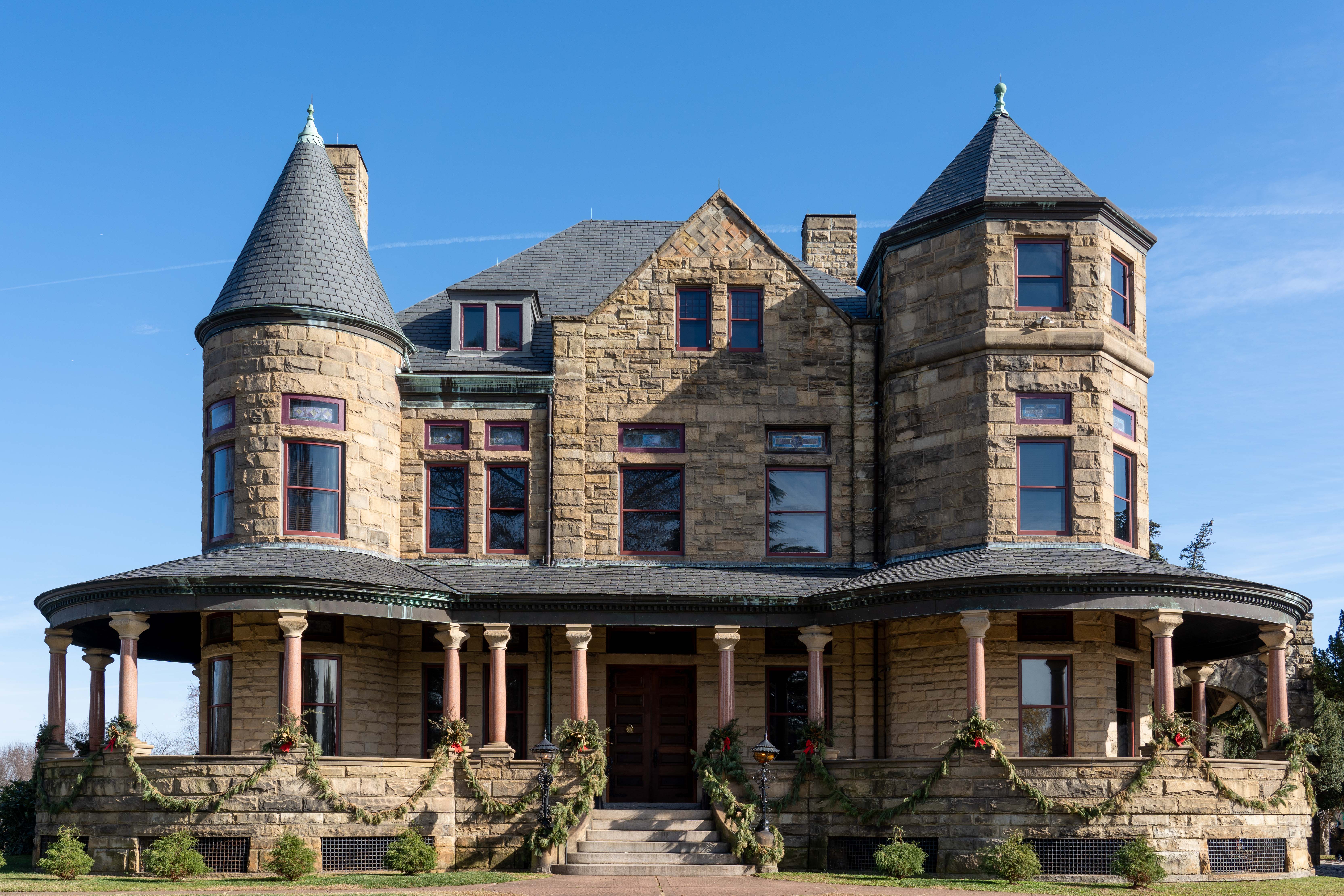 Grand stone Victorian mansion with turrets